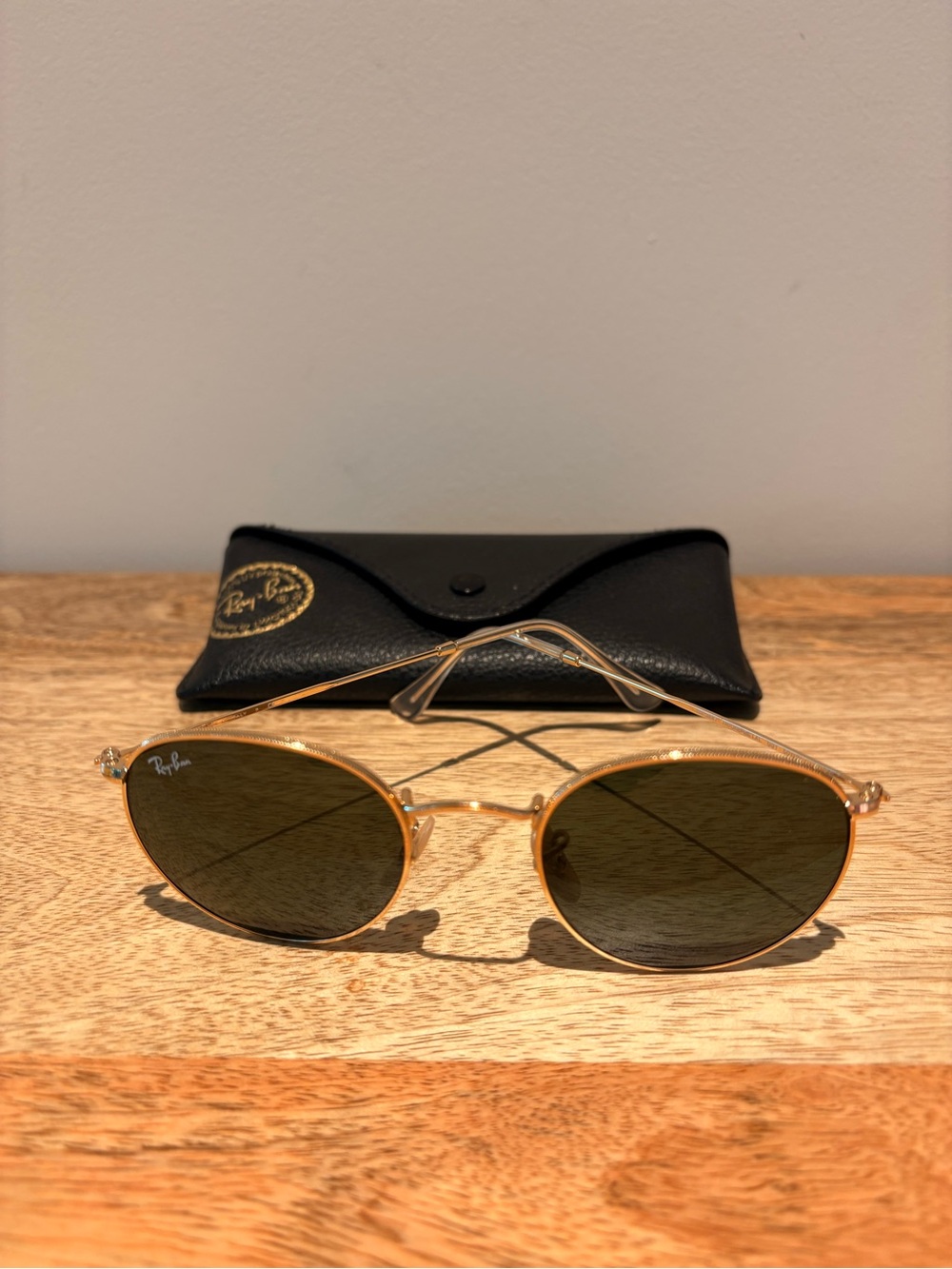 Ray-Ban Round Gold Frame Sunglasses with Dark Green Lenses
